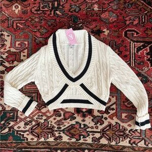 Elegant Cream and Black V-Neck Sweater